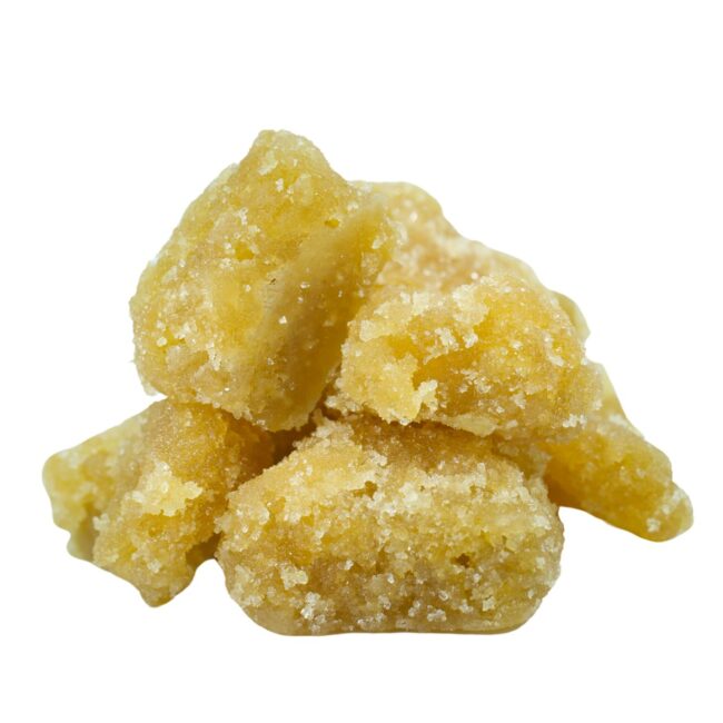 Pile of Pineapple Express Sugar Wax dabs – AAAA grade balanced hybrid cannabis concentrate with golden sugary texture