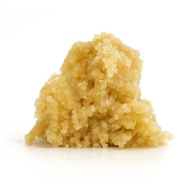 Photorealistic close-up of a light golden cannabis concentrate on a crisp white background.