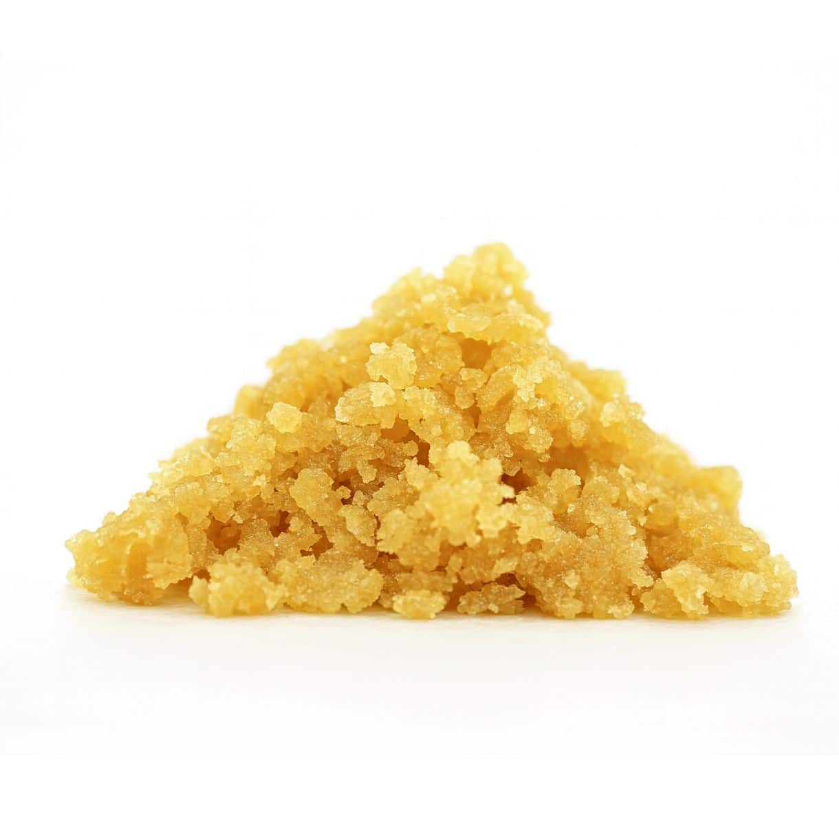 Golden cannabis crumble on a crisp white background, showcasing its granular texture, warm amber tones, and photorealistic detail.