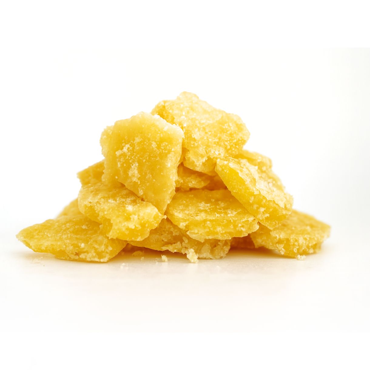 Photorealistic image of golden-yellow cannabis crumble stacked in a small pile on a crisp white background, showcasing detailed crystalline texture and slightly uneven, natural edges.