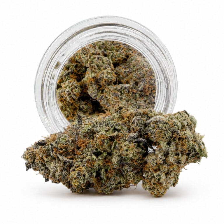 Dense cannabis flower with frosty trichomes in foreground, glass jar softly blurred on a crisp white background