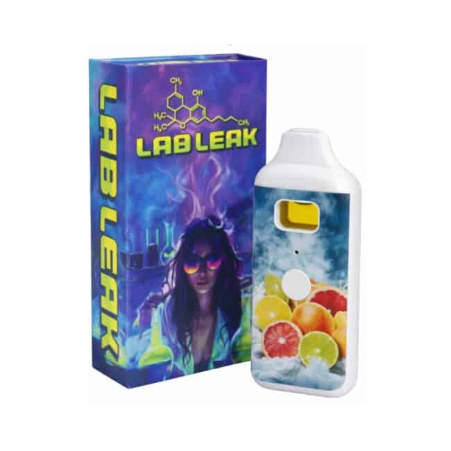 Photorealistic product image of a LAB LEAK disposable vape device with citrus fruit artwork displayed beside its branded packaging on a light background.