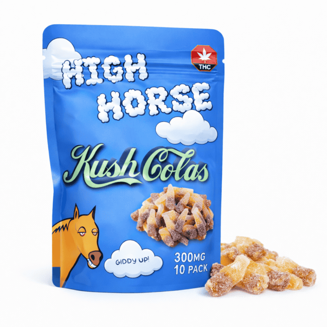 Blue resealable pouch of High Horse Kush Colas cannabis-infused cola bottle gummies with illustrated cloud graphics, THC symbol, and a pile of sugar-coated cola gummies displayed beside the package.