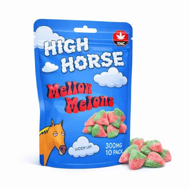 Blue resealable pouch of High Horse Mellow Melons cannabis-infused gummies with cloud graphics, THC symbol, illustrated horse character, and a pile of sugar-coated watermelon gummies displayed beside the package.