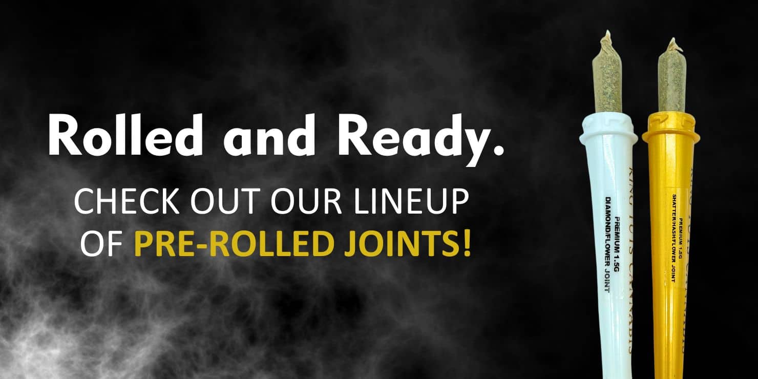 Promotional banner reading “Rolled and Ready. Check out our lineup of pre-rolled joints” with two pre-roll tubes in white and yellow against a smoky dark background.