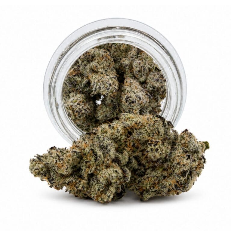 Dense cannabis flower with frosty trichomes in foreground, glass jar softly blurred on a crisp white background